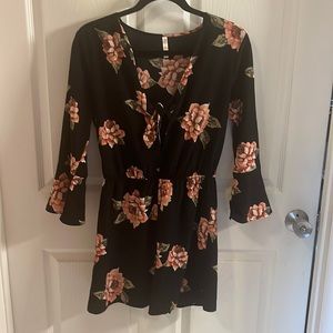 Xhiliration romper size small. Pink rose print. Long sleeves